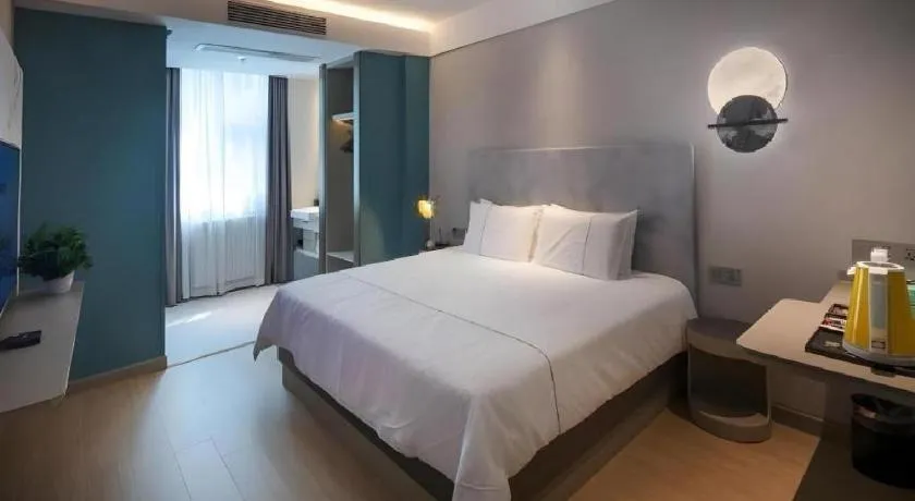 Bed in Magnotel Hotel Shiyan Wuyan Pedestrian Street