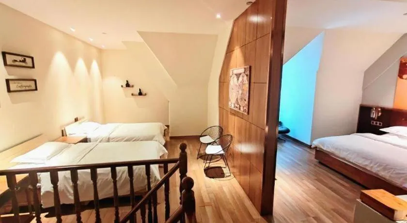 Bed in James Joyce Coffetel Zhengzhou CBD Exhibition Center Provincial People's Hospital