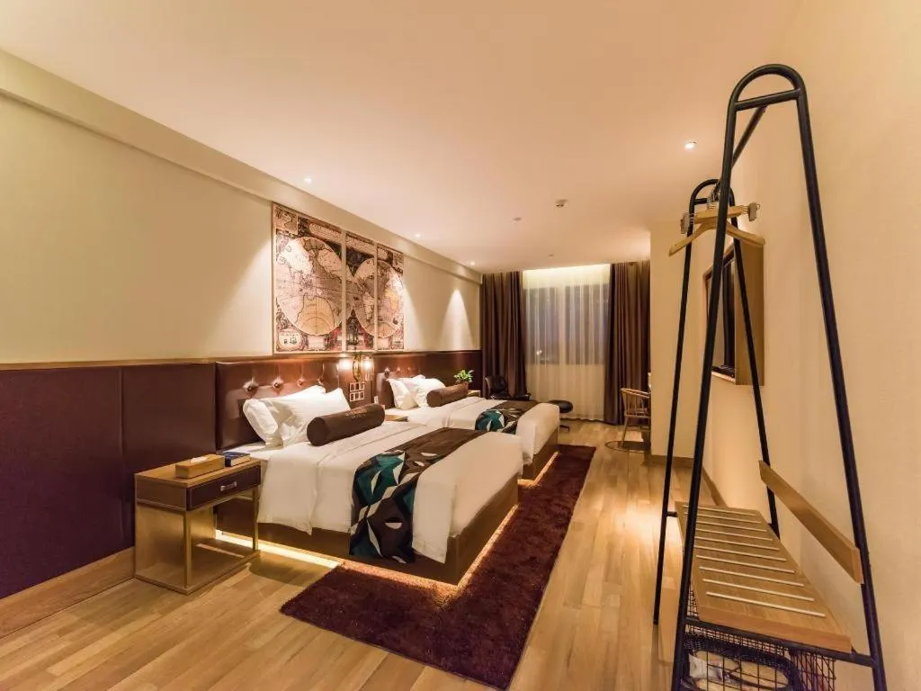 Bed in James Joyce Coffetel Zhengzhou CBD Exhibition Center Provincial People's Hospital