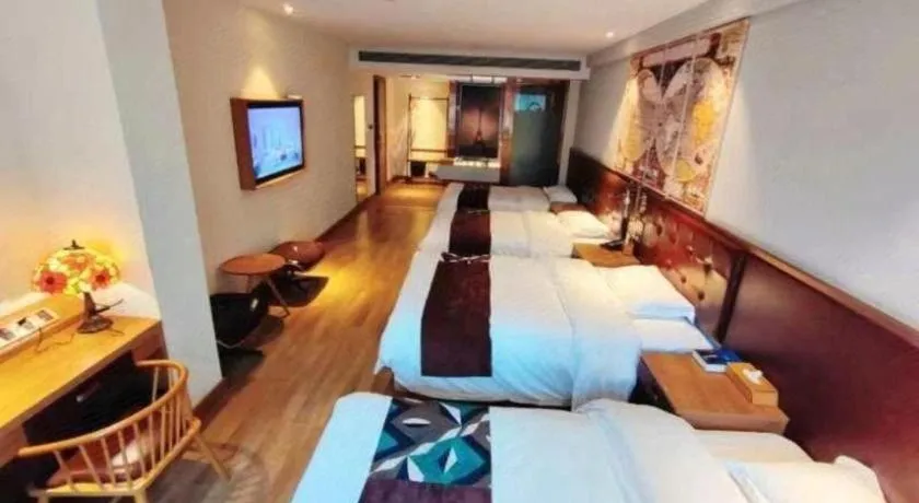 Bed in James Joyce Coffetel Zhengzhou CBD Exhibition Center Provincial People's Hospital