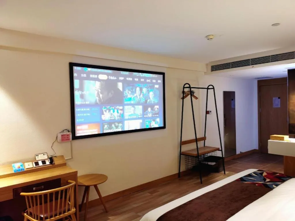 Bed in James Joyce Coffetel Zhengzhou CBD Exhibition Center Provincial People's Hospital