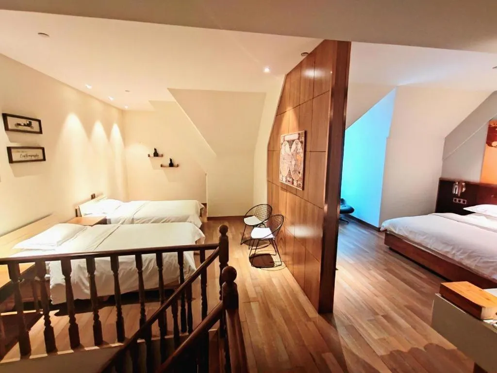 Bed in James Joyce Coffetel Zhengzhou CBD Exhibition Center Provincial People's Hospital