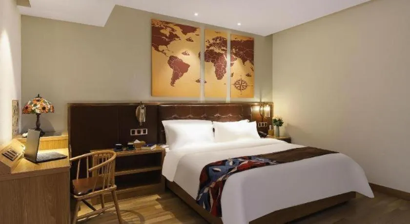 Bed in James Joyce Coffetel Zhengzhou CBD Exhibition Center Provincial People's Hospital