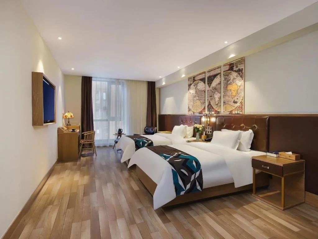 Bed in James Joyce Coffetel Zhengzhou CBD Exhibition Center Provincial People's Hospital