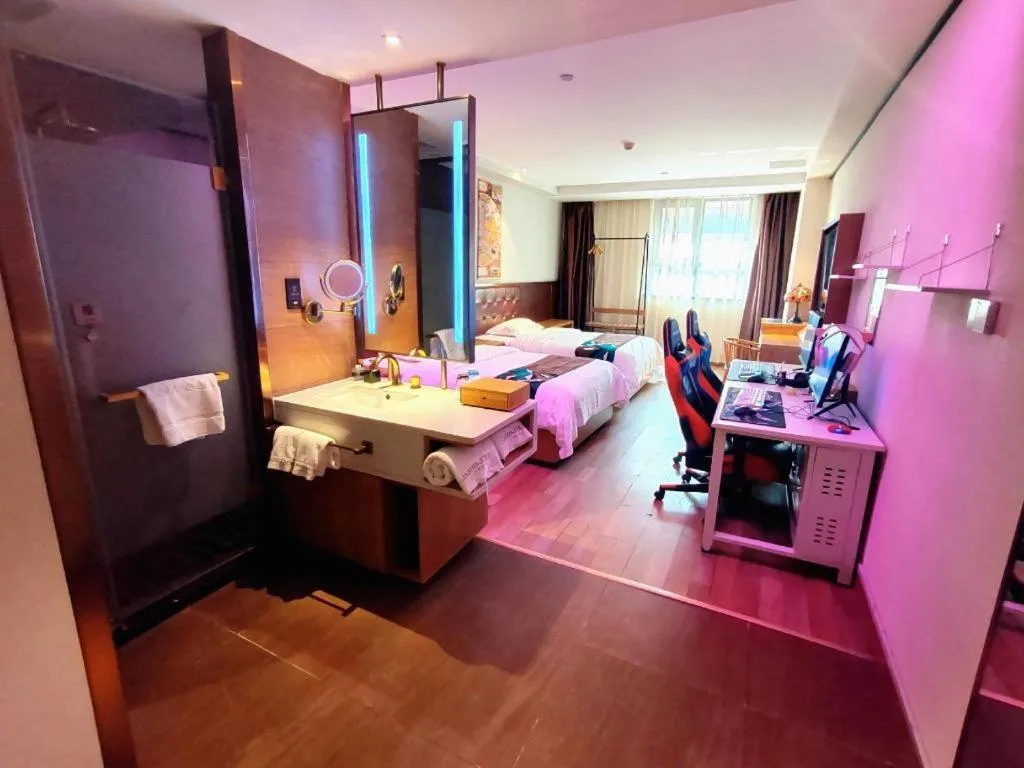 Bed in James Joyce Coffetel Zhengzhou CBD Exhibition Center Provincial People's Hospital
