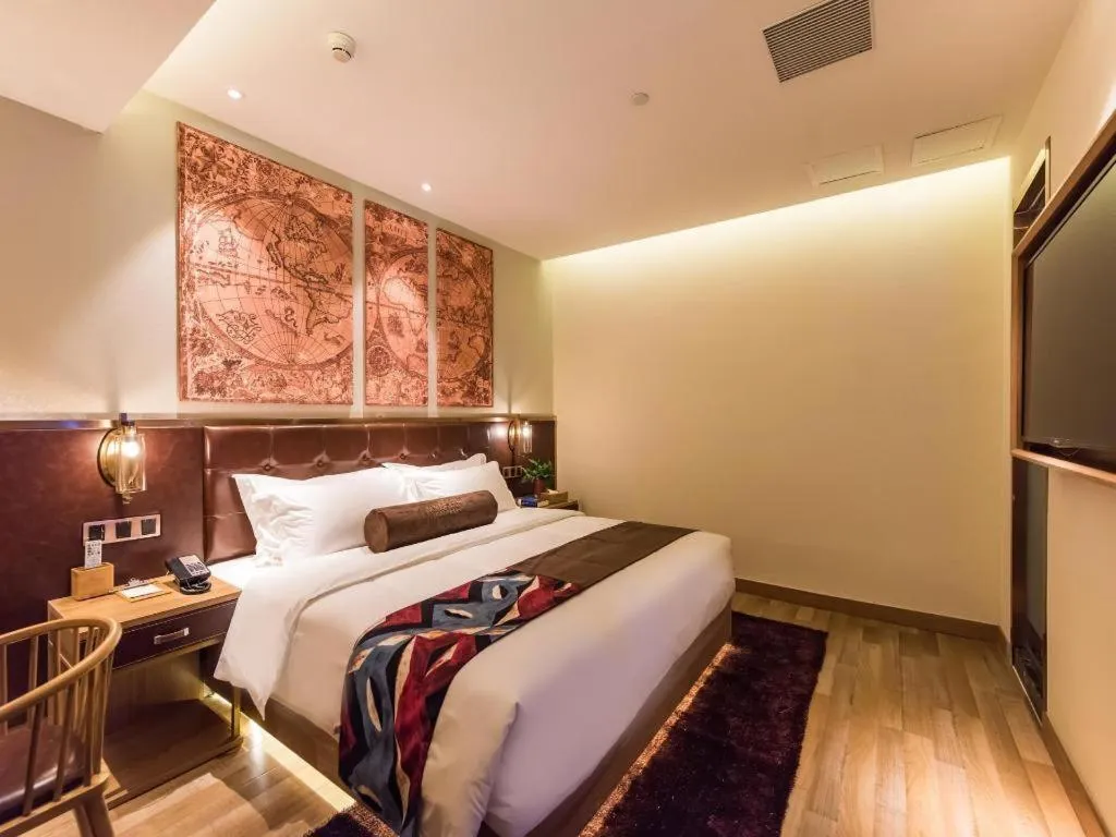 Bed in James Joyce Coffetel Zhengzhou CBD Exhibition Center Provincial People's Hospital