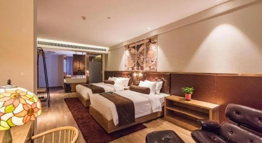 Bed in James Joyce Coffetel Zhengzhou CBD Exhibition Center Provincial People's Hospital