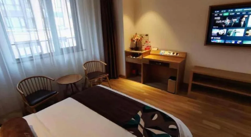 Bed in James Joyce Coffetel Zhengzhou CBD Exhibition Center Provincial People's Hospital