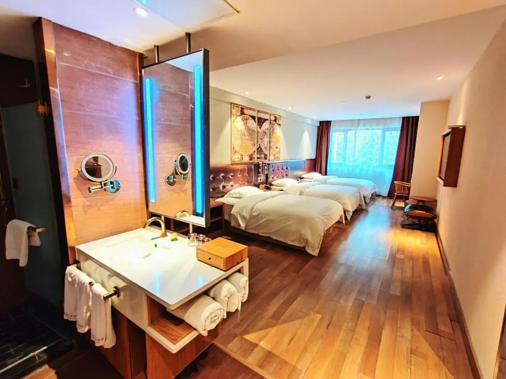 Bed in James Joyce Coffetel Zhengzhou CBD Exhibition Center Provincial People's Hospital