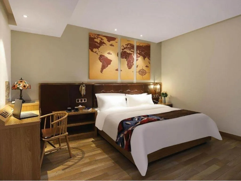 Bed in James Joyce Coffetel Zhengzhou CBD Exhibition Center Provincial People's Hospital