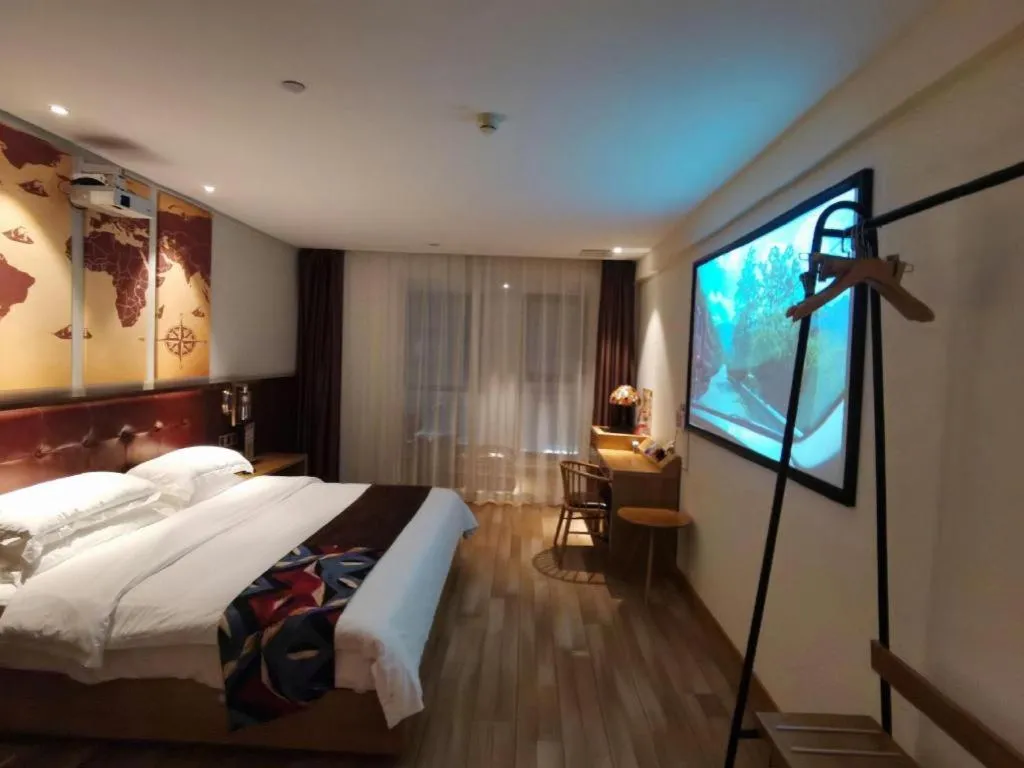 Bed in James Joyce Coffetel Zhengzhou CBD Exhibition Center Provincial People's Hospital