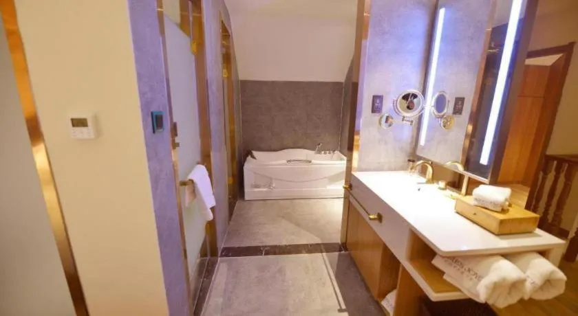 Bed in James Joyce Coffetel Zhengzhou CBD Exhibition Center Provincial People's Hospital