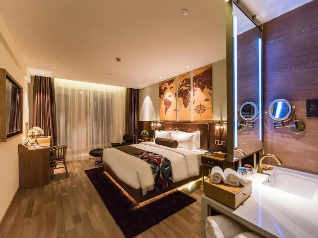 Bed in James Joyce Coffetel Zhengzhou CBD Exhibition Center Provincial People's Hospital