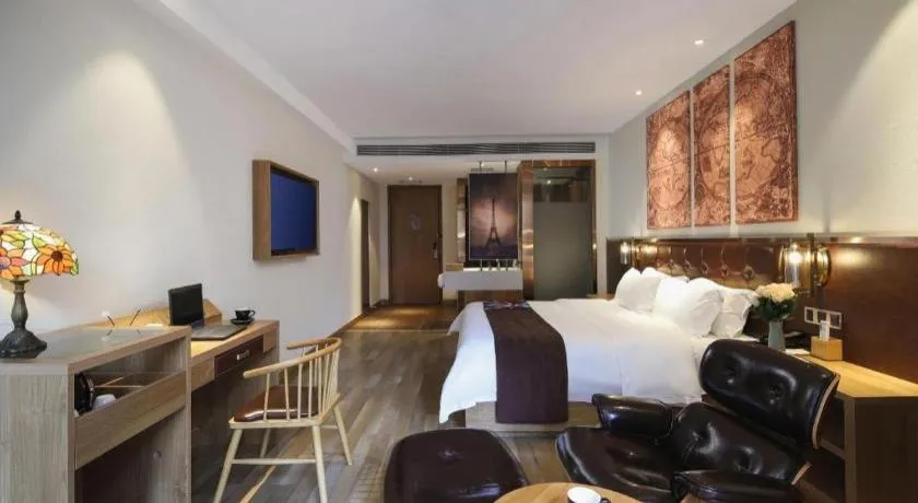 Bed in James Joyce Coffetel Zhengzhou CBD Exhibition Center Provincial People's Hospital