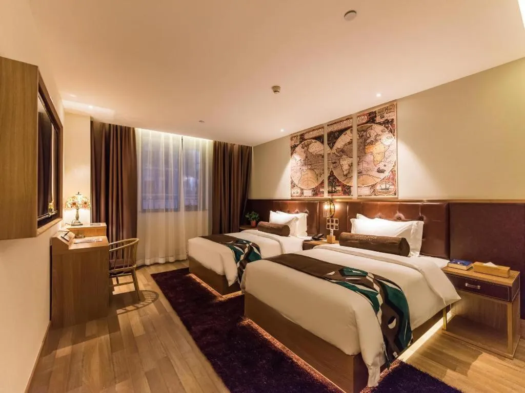 Bed in James Joyce Coffetel Zhengzhou CBD Exhibition Center Provincial People's Hospital