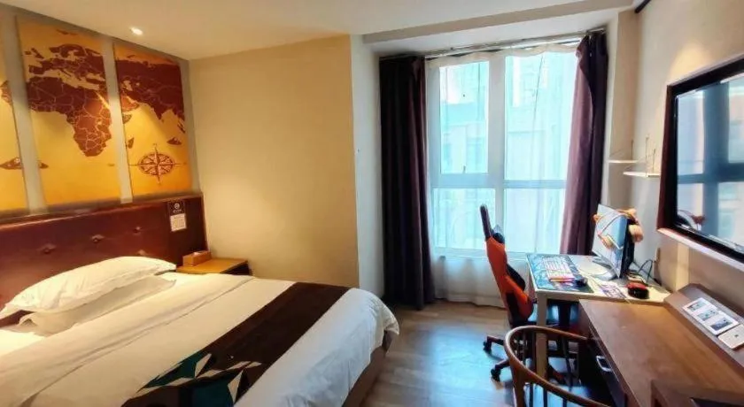 Bed in James Joyce Coffetel Zhengzhou CBD Exhibition Center Provincial People's Hospital