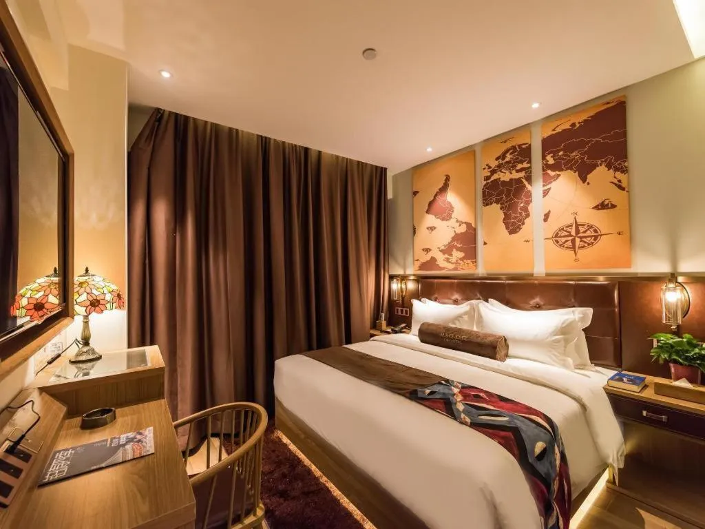 Bed in James Joyce Coffetel Zhengzhou CBD Exhibition Center Provincial People's Hospital