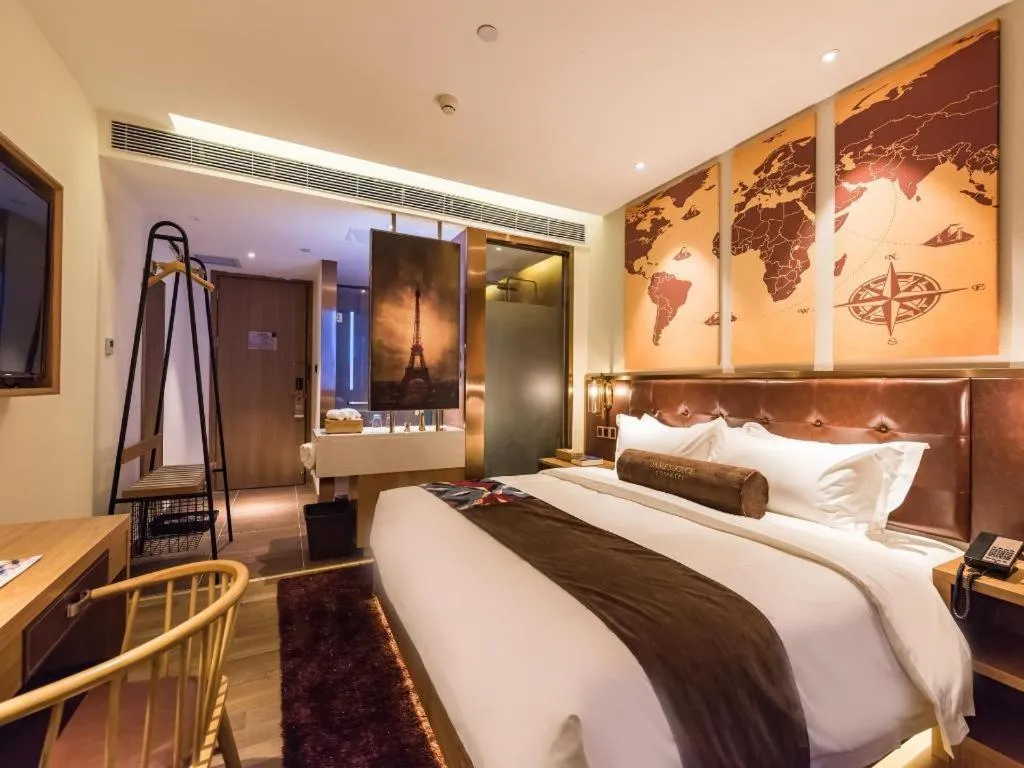 Bed in James Joyce Coffetel Zhengzhou CBD Exhibition Center Provincial People's Hospital