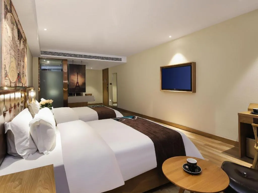 Bed in James Joyce Coffetel Zhengzhou CBD Exhibition Center Provincial People's Hospital