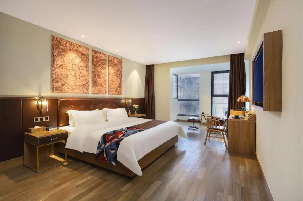 Bed in James Joyce Coffetel Zhengzhou CBD Exhibition Center Provincial People's Hospital