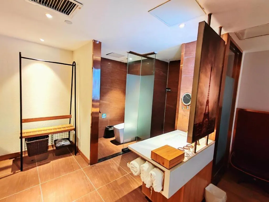 Bed in James Joyce Coffetel Zhengzhou CBD Exhibition Center Provincial People's Hospital