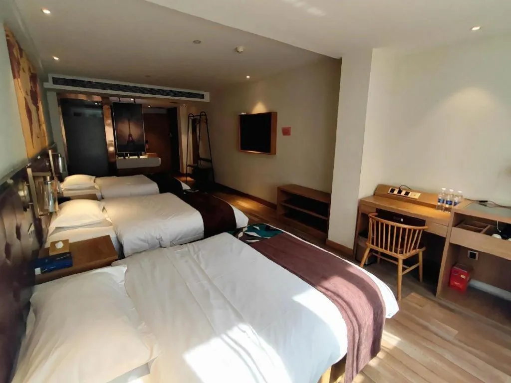 Bed in James Joyce Coffetel Zhengzhou CBD Exhibition Center Provincial People's Hospital