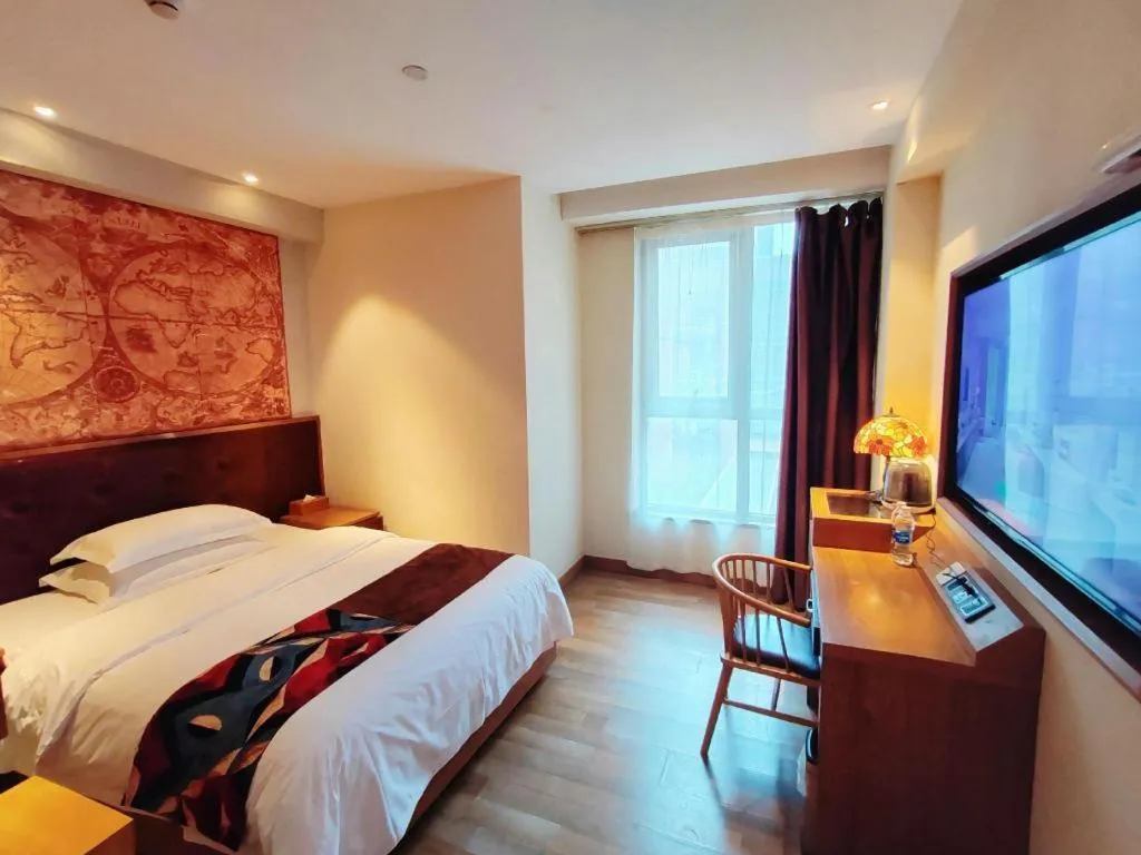 Bed in James Joyce Coffetel Zhengzhou CBD Exhibition Center Provincial People's Hospital