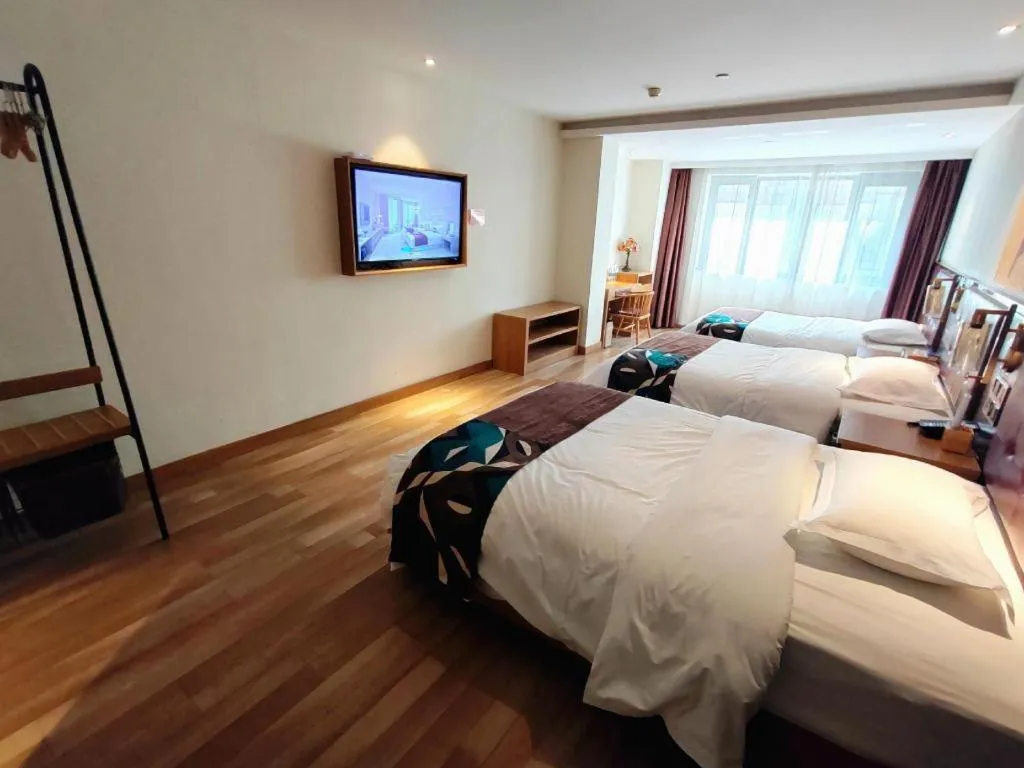 Bed in James Joyce Coffetel Zhengzhou CBD Exhibition Center Provincial People's Hospital