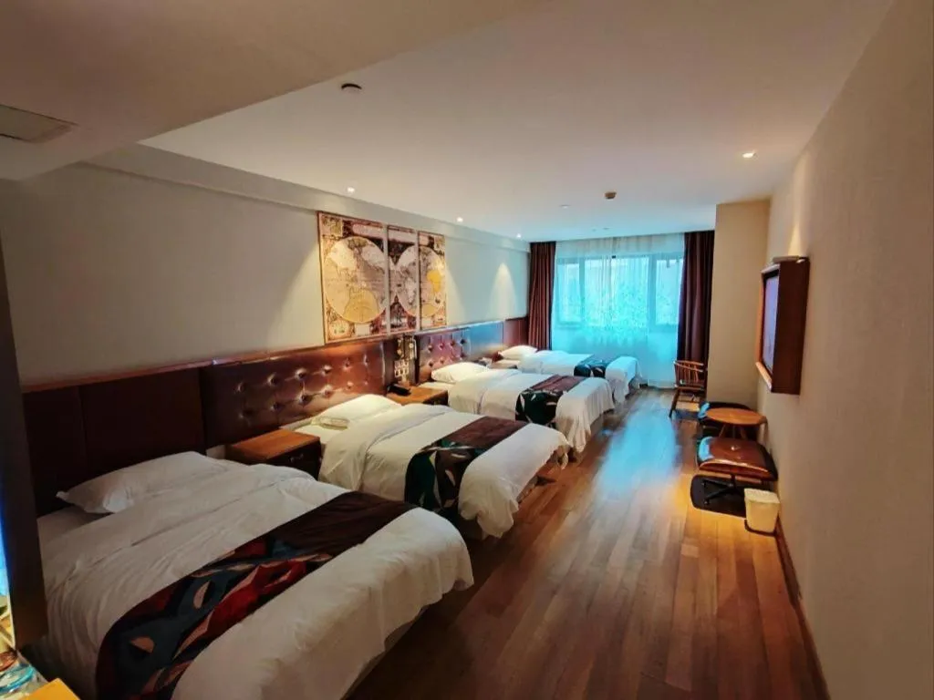 Bed in James Joyce Coffetel Zhengzhou CBD Exhibition Center Provincial People's Hospital