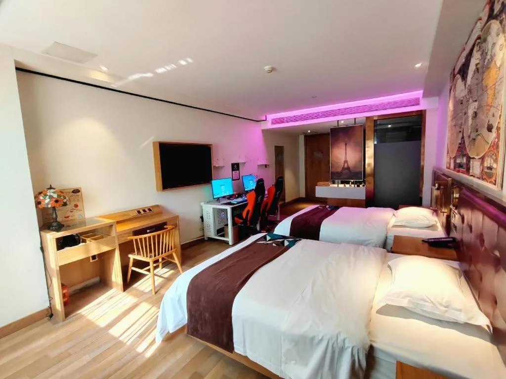 Bed in James Joyce Coffetel Zhengzhou CBD Exhibition Center Provincial People's Hospital