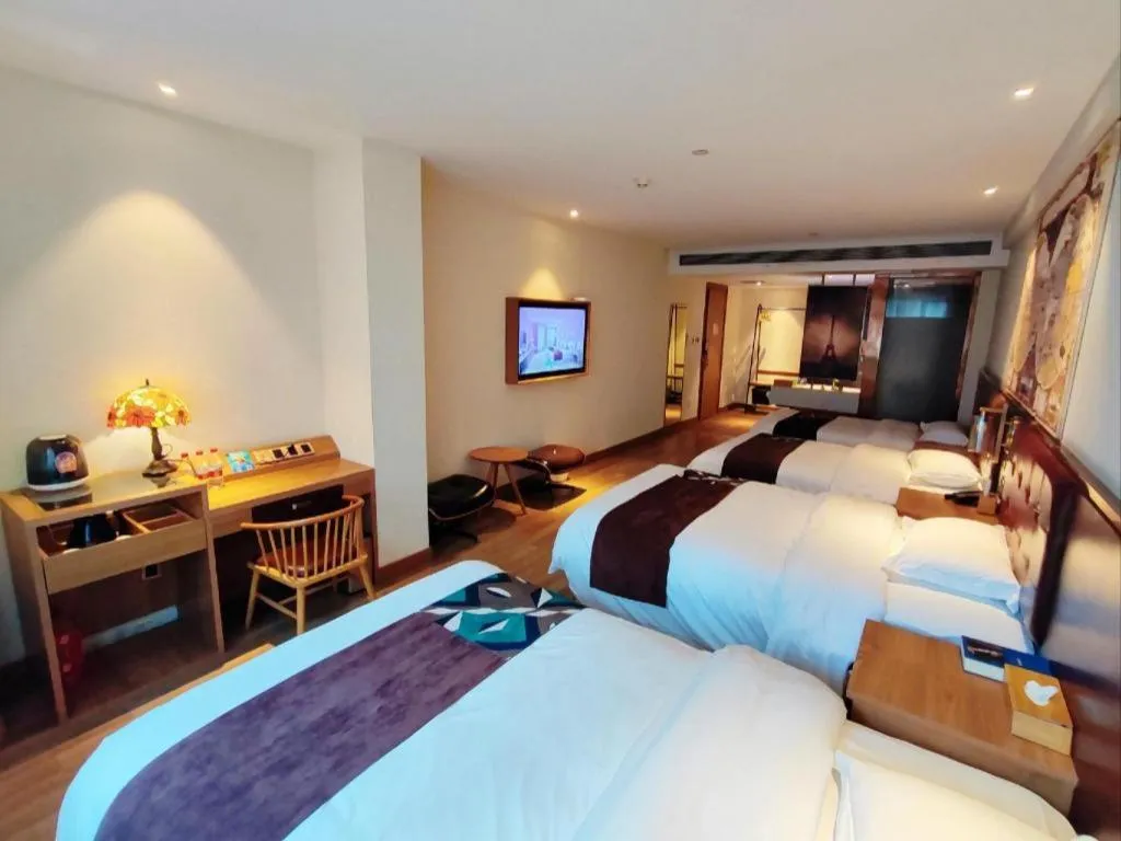 Bed in James Joyce Coffetel Zhengzhou CBD Exhibition Center Provincial People's Hospital