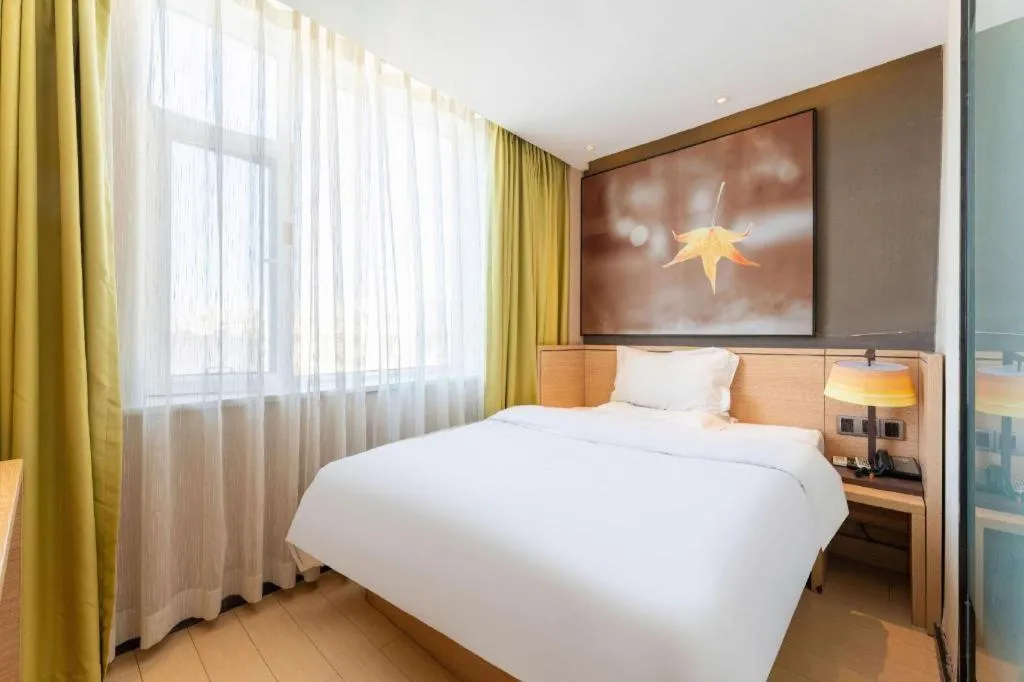 Bed in IU Hotel·Jiayuguan People's Shopping Mall