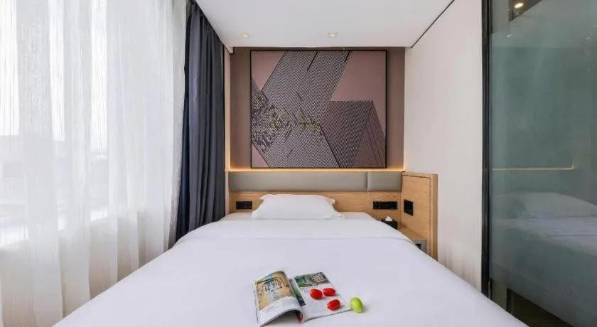 Bed in IU Hotel·Jiayuguan People's Shopping Mall