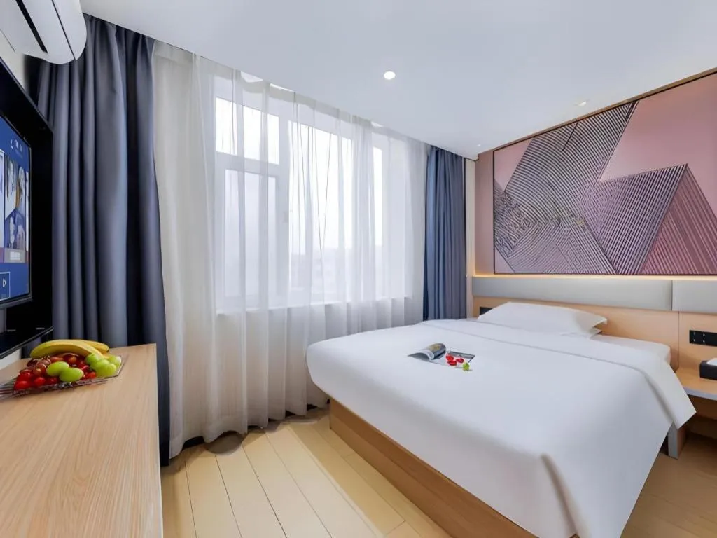 Bed in IU Hotel·Jiayuguan People's Shopping Mall