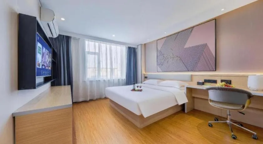 Bed in IU Hotel·Jiayuguan People's Shopping Mall