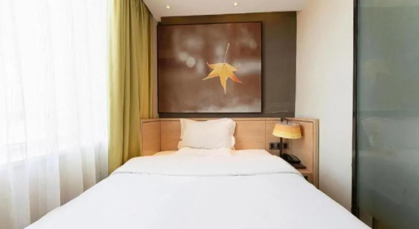 Bed in IU Hotel·Jiayuguan People's Shopping Mall