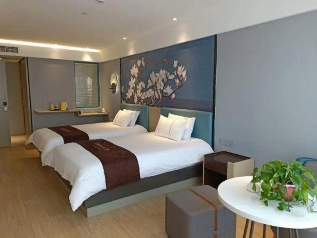 Bed in Magnotel Hotel Anshun West High-Speed Railway Station