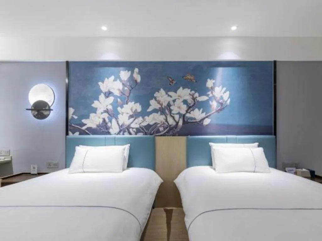 Bed in Magnotel Hotel Anshun West High-Speed Railway Station