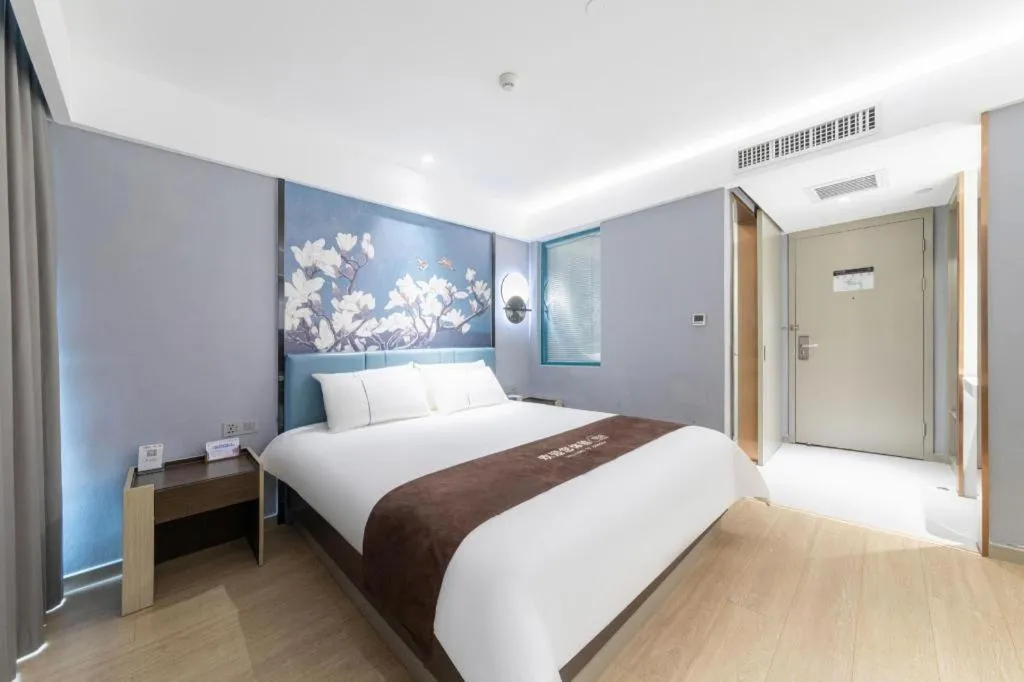 Bed in Magnotel Hotel Anshun West High-Speed Railway Station