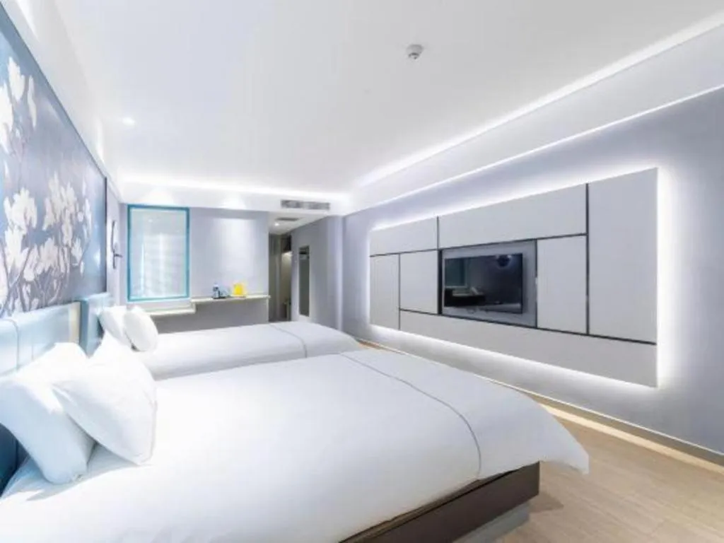 Bed in Magnotel Hotel Anshun West High-Speed Railway Station