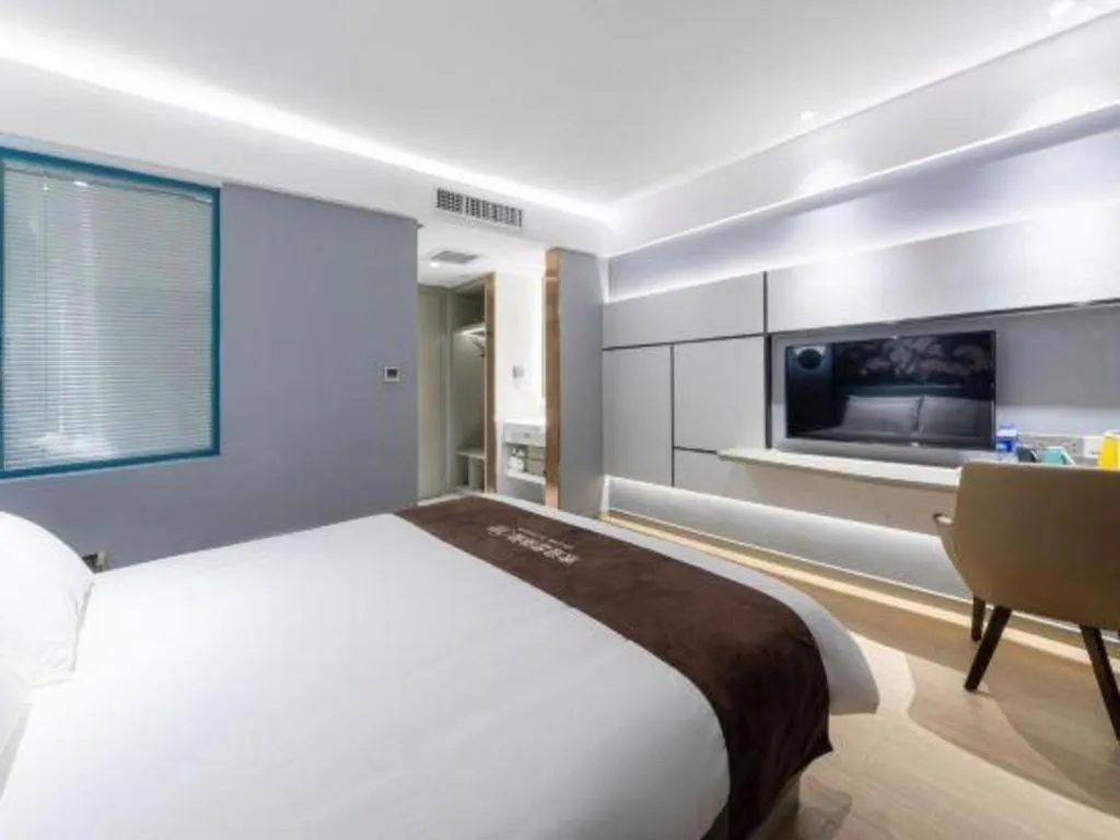 Bed in Magnotel Hotel Anshun West High-Speed Railway Station