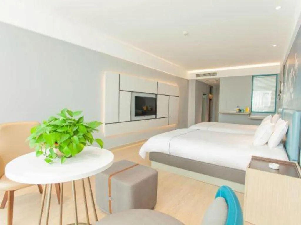 Bed in Magnotel Hotel Anshun West High-Speed Railway Station