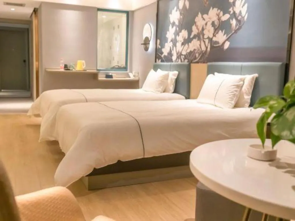 Bed in Magnotel Hotel Anshun West High-Speed Railway Station