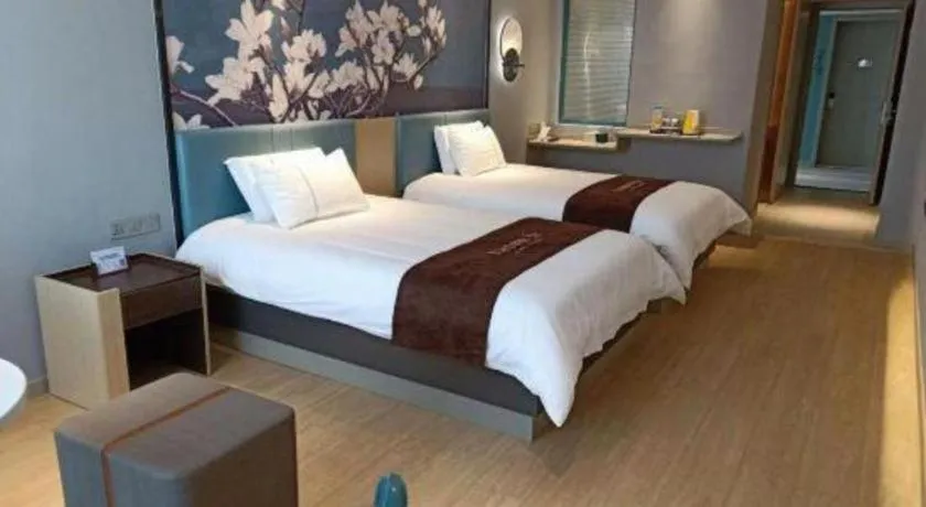 Bed in Magnotel Hotel Anshun West High-Speed Railway Station