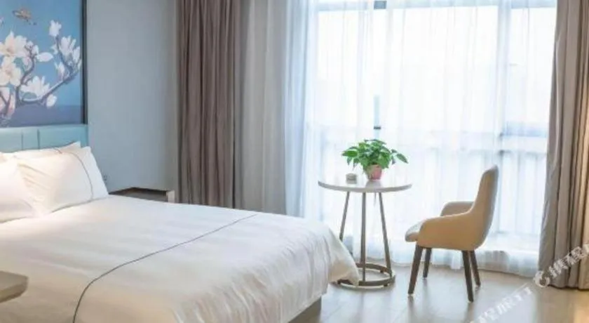 Bed in Magnotel Hotel Anshun West High-Speed Railway Station