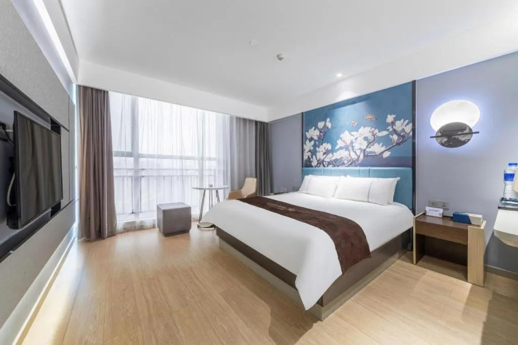 Bed in Magnotel Hotel Anshun West High-Speed Railway Station