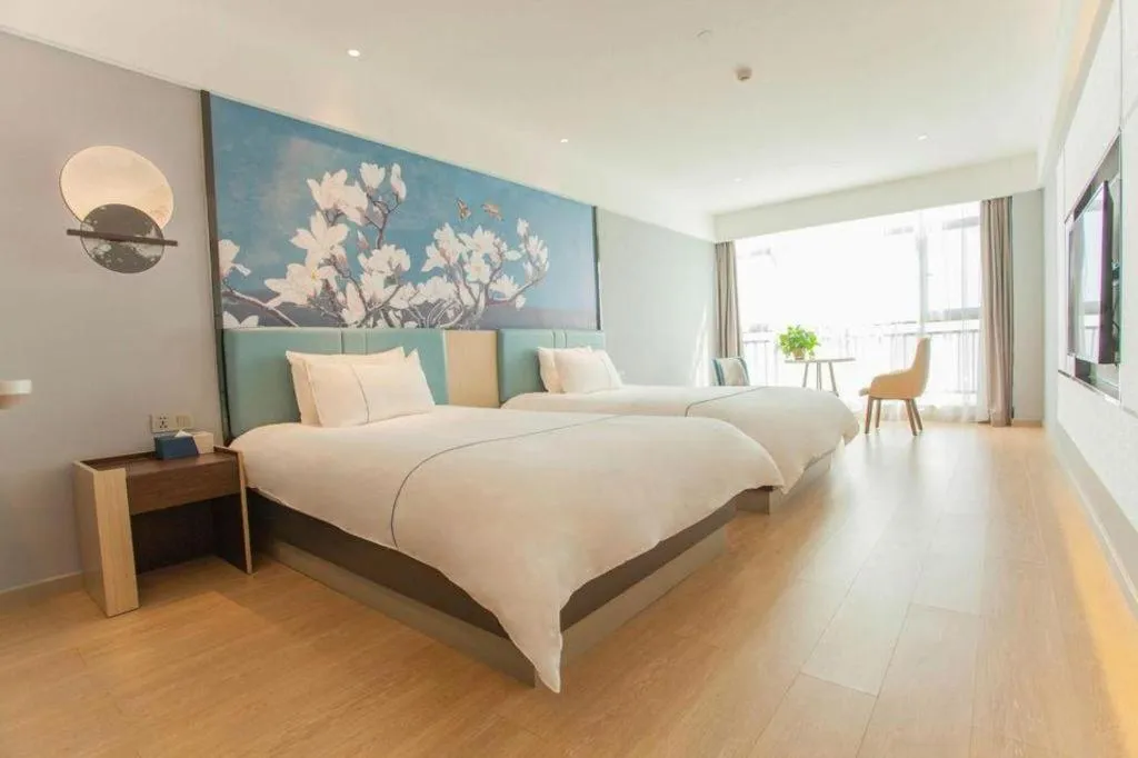 Bed in Magnotel Hotel Anshun West High-Speed Railway Station