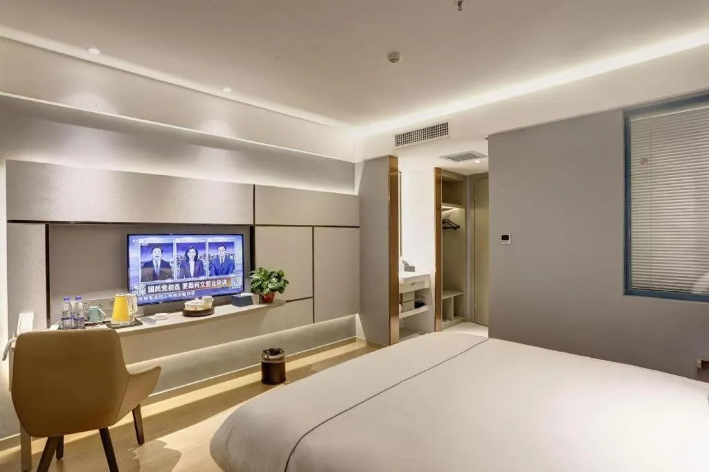 Bed in Magnotel Hotel Anshun West High-Speed Railway Station