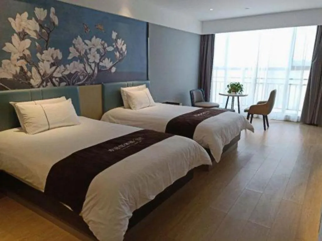 Bed in Magnotel Hotel Anshun West High-Speed Railway Station