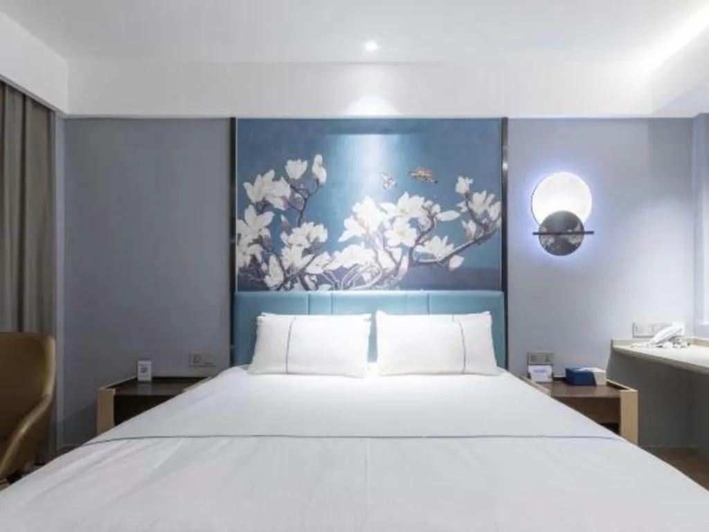 Bed in Magnotel Hotel Anshun West High-Speed Railway Station